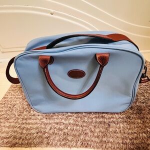 Longchamp Le Pliage Travel Bag light blue with strep and carry handles